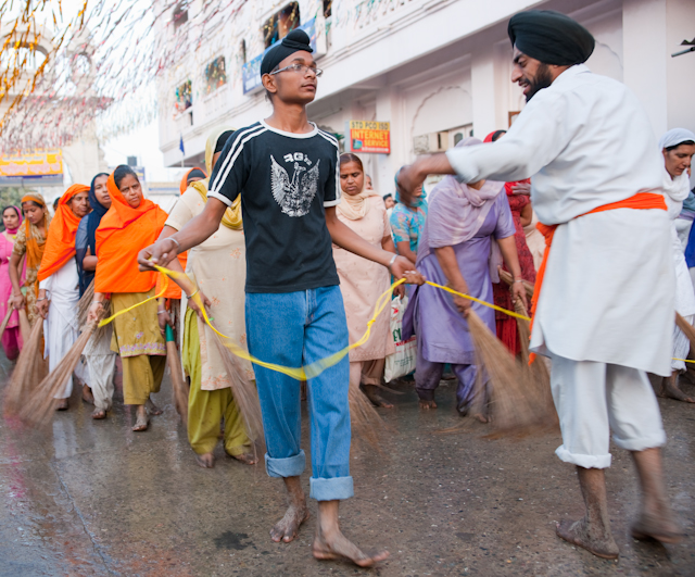 _DSC1392.jpg - Sweeping before the holy book