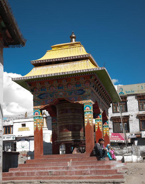 _DSC9801.jpg - Prayer wheels near the bus station.  Indian roads are bad enough that prayer is required!