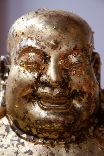 Thailand_Ayutthaya_OctNovDec_2010_7474.jpg - They sell gold leaf to stick on the idols.